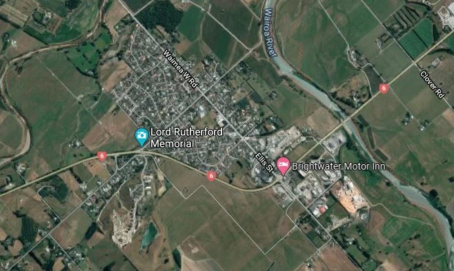 Man dies after being trapped under bus