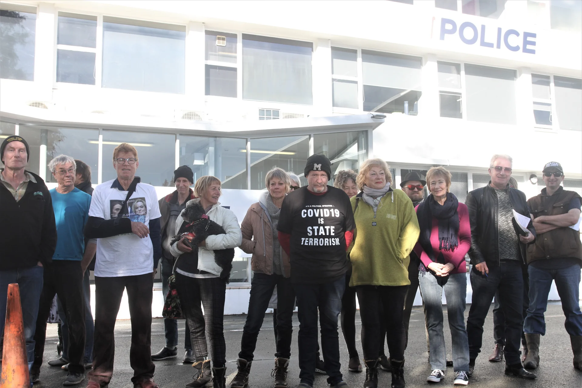 Anti-lockdown protestors gather outside Nelson Police Station