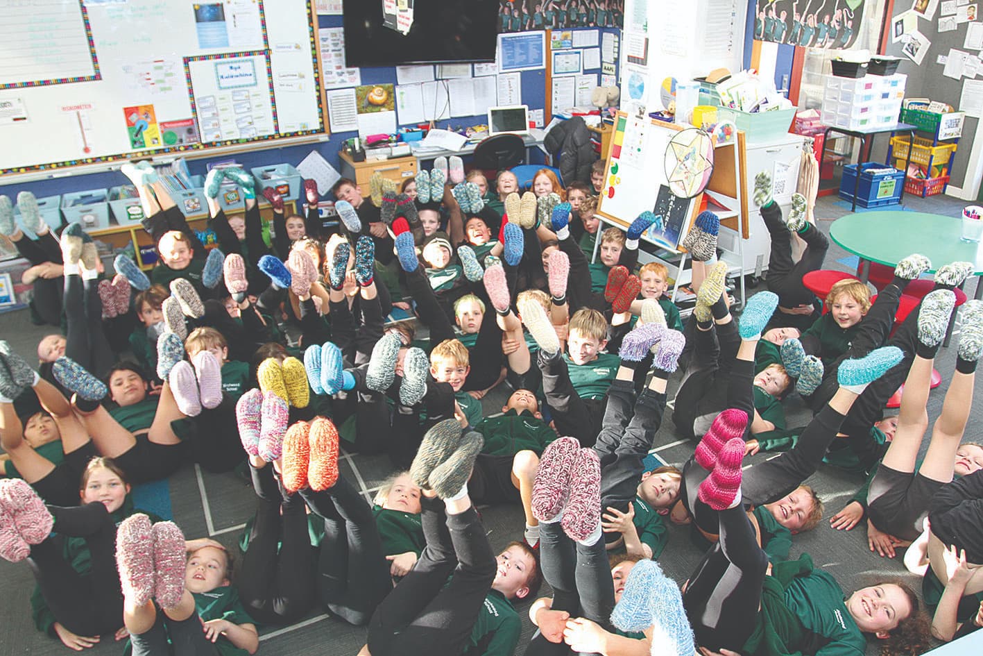 School kids' feet warmed by winter knitters
