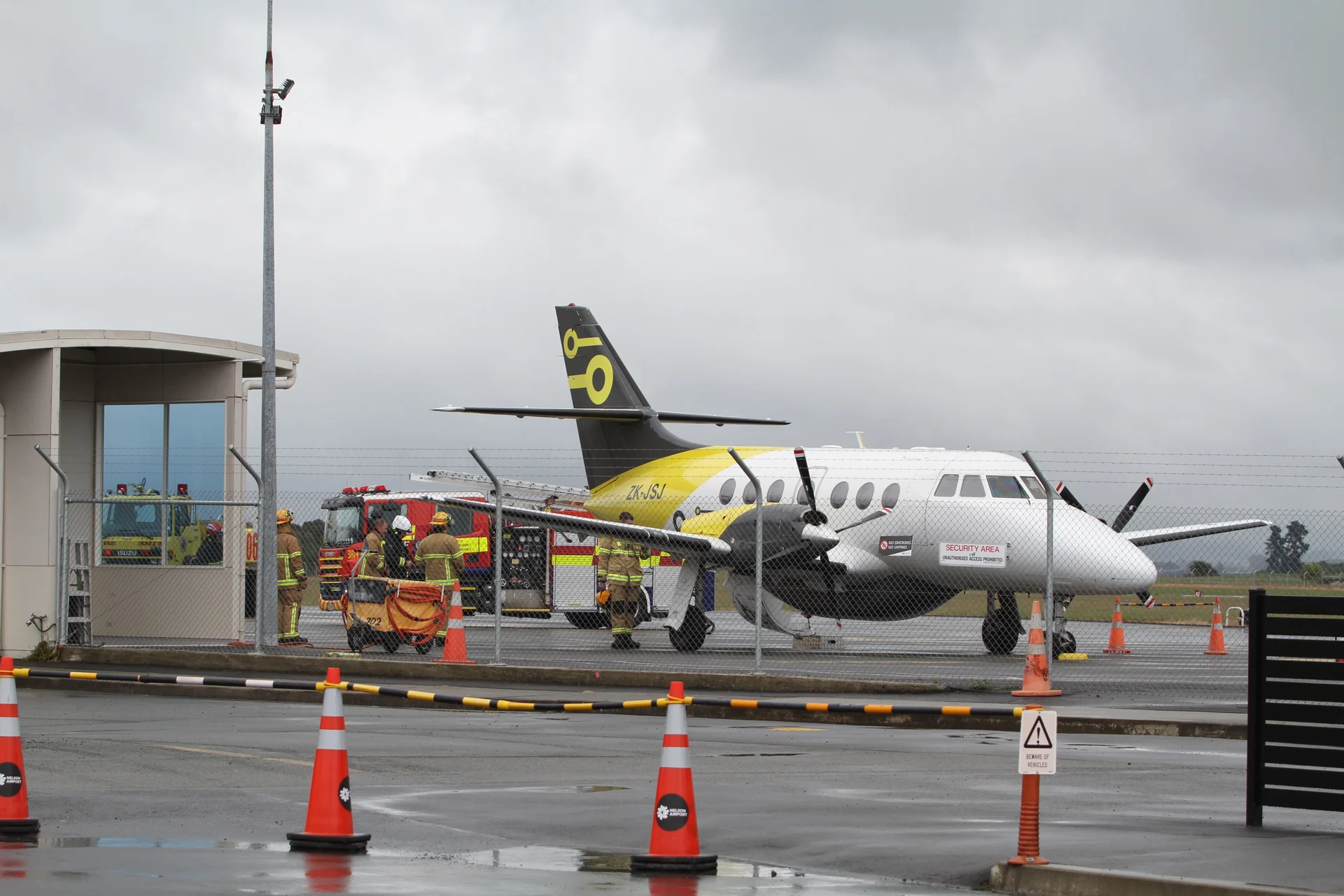 Safe landing after emergency services rush to airport