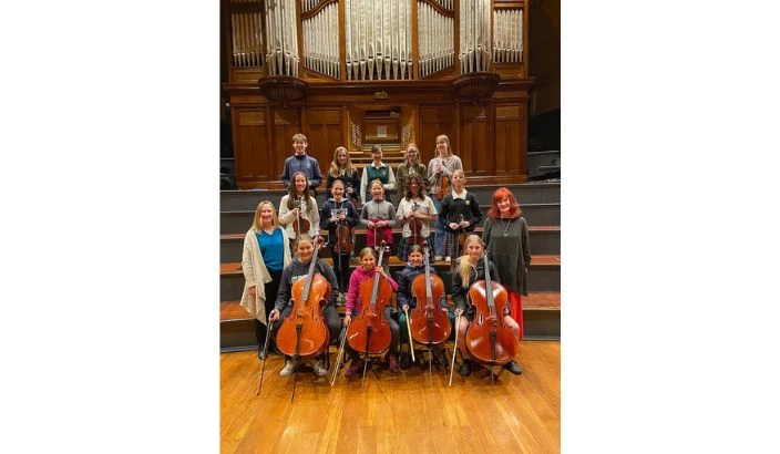 Young string musicians touring Tasman