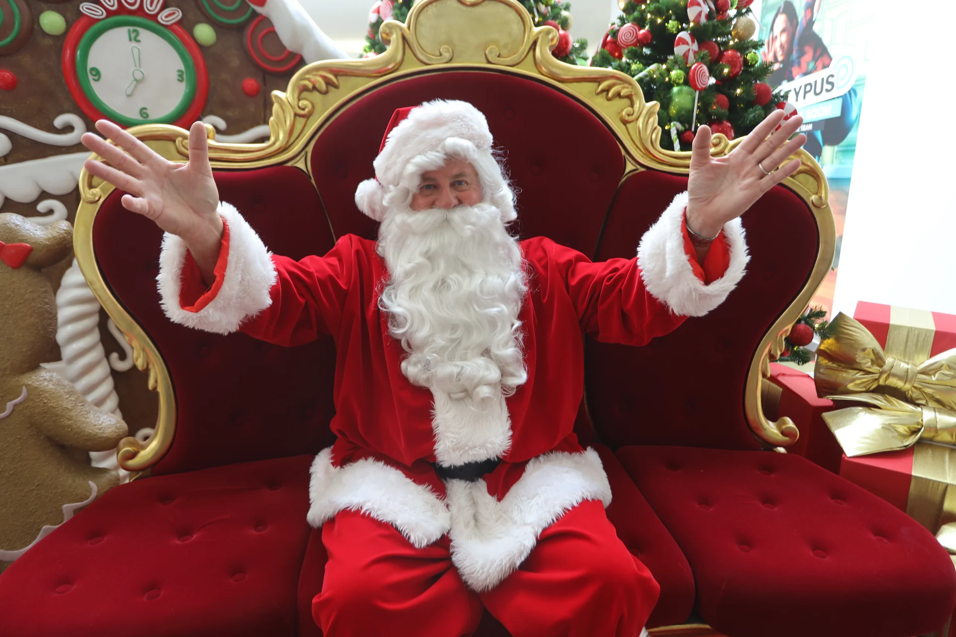 Christmas spirit ringing for mall Santa