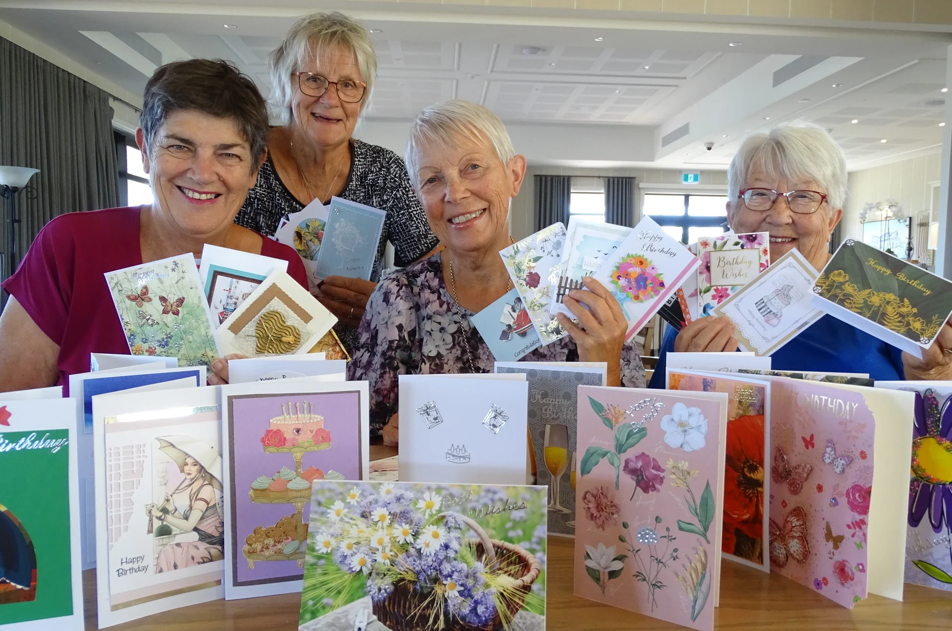 Upcycling birthday cards for village