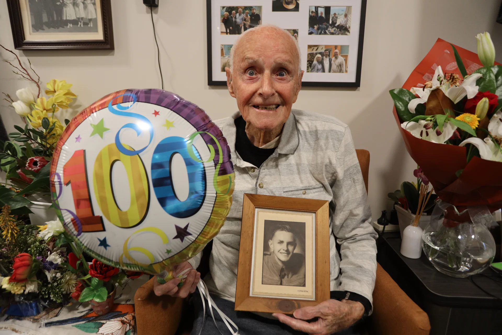 Norman smiles his way into centenary