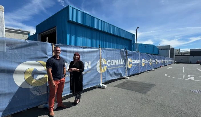 Mall’s big blue wall to go