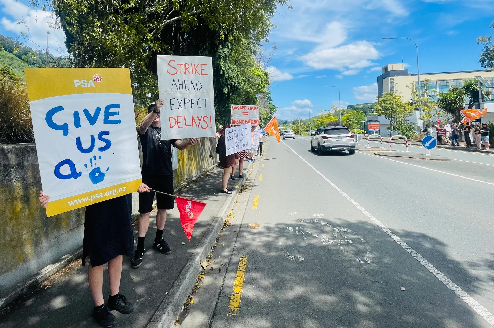 Hundreds of health workers strike