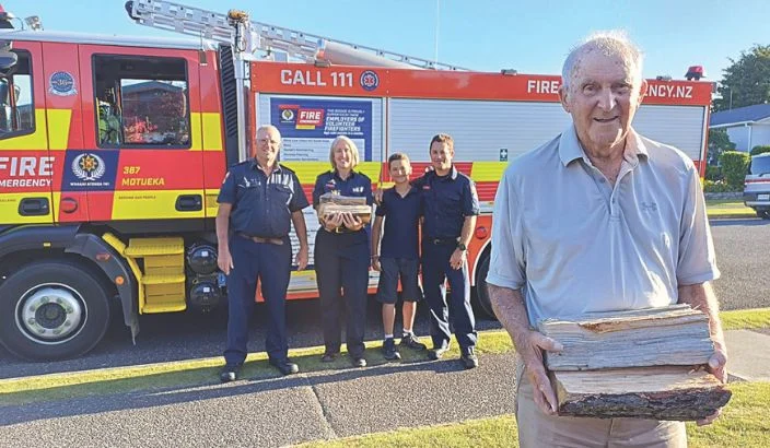 Firefighters swap hoses for wheelbarrows in act of kindness