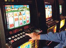 Local pokies fed $15,000 a day