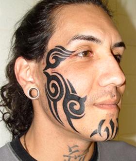 Tats 'no reason for ban'
