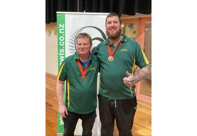 Bowlers come home with new bling