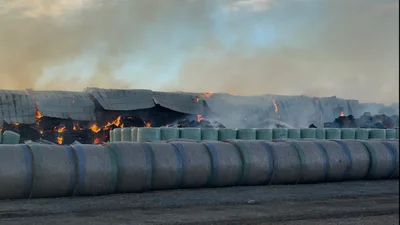 Massive fire eats thousands of hay bales