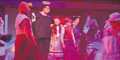 Mary Poppins flies into town