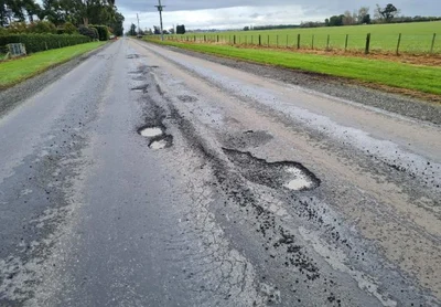 Truck crashes, killing livestock, on 'potholed' road due for repairs