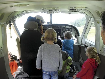Young thrillseekers check out planes