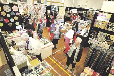 Quilters compare threads in riot of colour