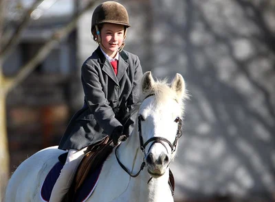 Young equestrians in form