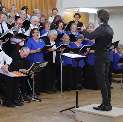 Combined choirs entertain 150